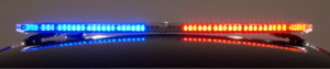 red and blue led lights on top of a police vehicle