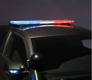 red white and blue led lights on top of a police cruiser