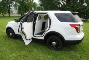 white police interceptor with k-9 transportation in the back