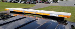 yellow led lights on top of a police vehicle