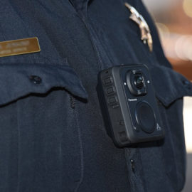 panasonic Arbitrator body cam displayed on officers chest