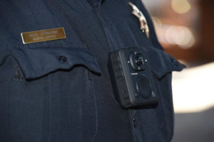 panasonic Arbitrator body cam displayed on officers chest